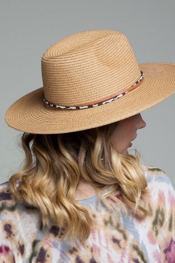 Gorgeous featuring a double trim with animal print and wide brim with inner adjustable band panama hat