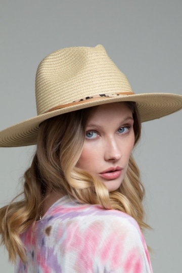 Gorgeous featuring a double trim with animal print and wide brim with inner adjustable band panama hat