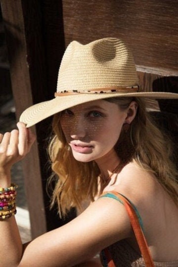 Gorgeous featuring a double trim with animal print and wide brim with inner adjustable band panama hat